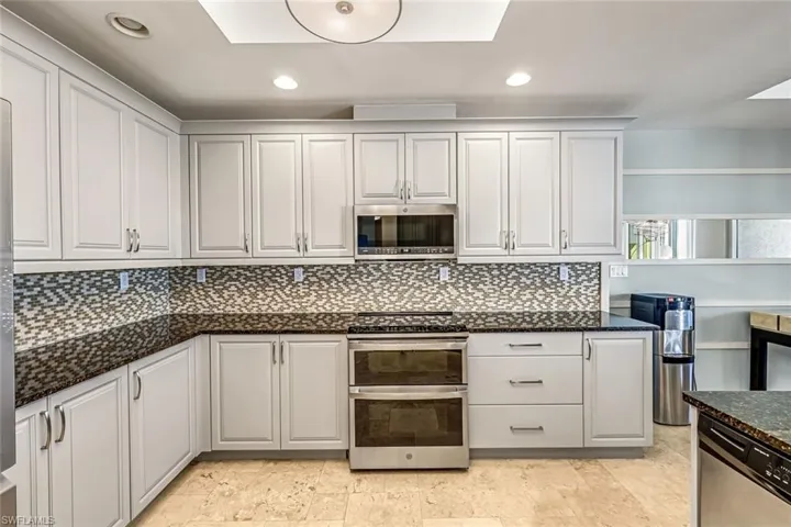 Kitchen with Gray Cabinets and Plenty of Counter Space