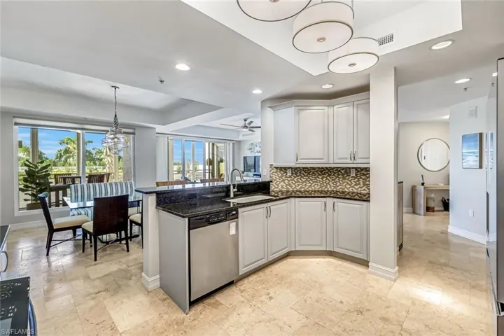 View of Living Area and Outdoor Living Space from Kitchen