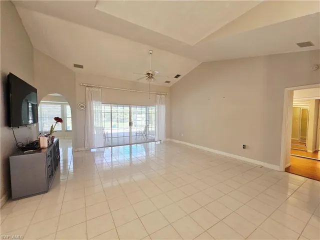 Large living area with sliders to your huge pool area