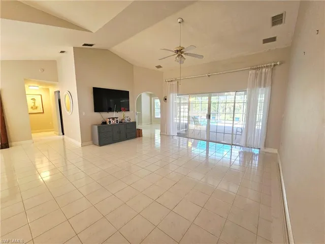 Large living area w/sliders to your oversized pool area