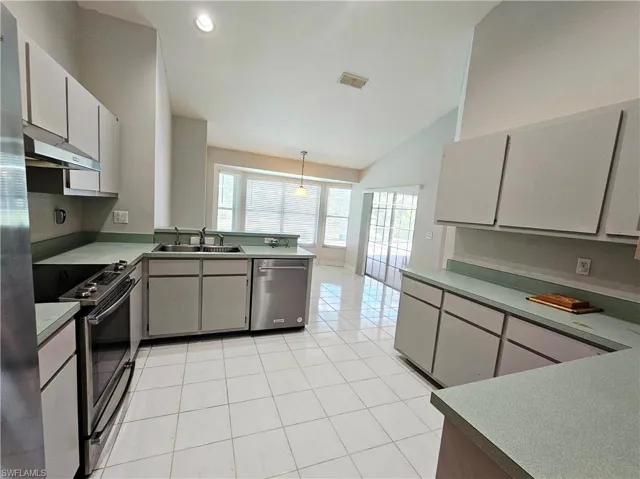 Plenty of cabinets & stainless steel appliances