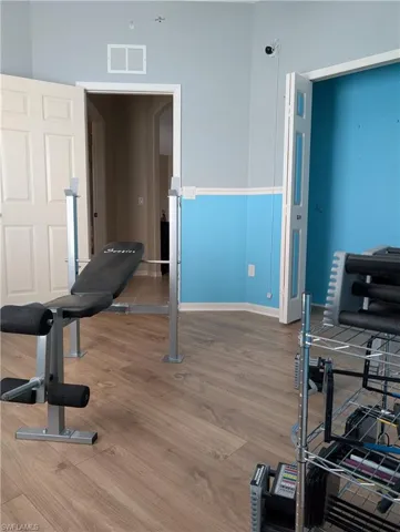 Hardwood wood-style floors and ceiling fan