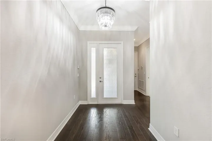 Foyer with glass entry door for added light.