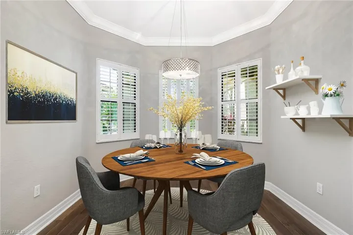 Casual dining area in the kitchen, with plantation shutters (virtual staging)