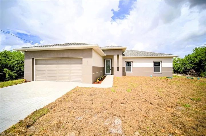Lovely Brand New Canal Side 3 Bedroom (Plus Private Home Office/Den/Or 4th Bedroom) 2 Bathroom/2 Car Garage Home In Lehigh Acres, FL!