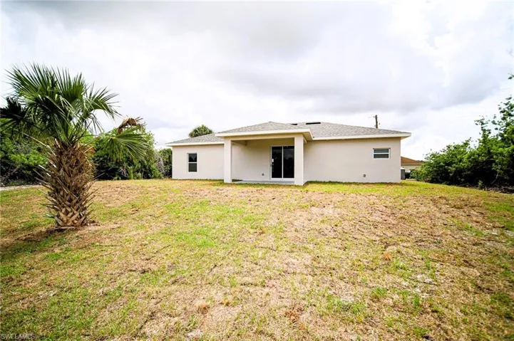 Awesome Back Yard With Penty Of Room For A Pool And It Comes With A Palm Tree!
