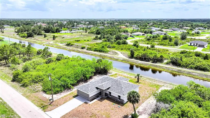 This Lovely New Home Backs Up On A Freshwater Canal!