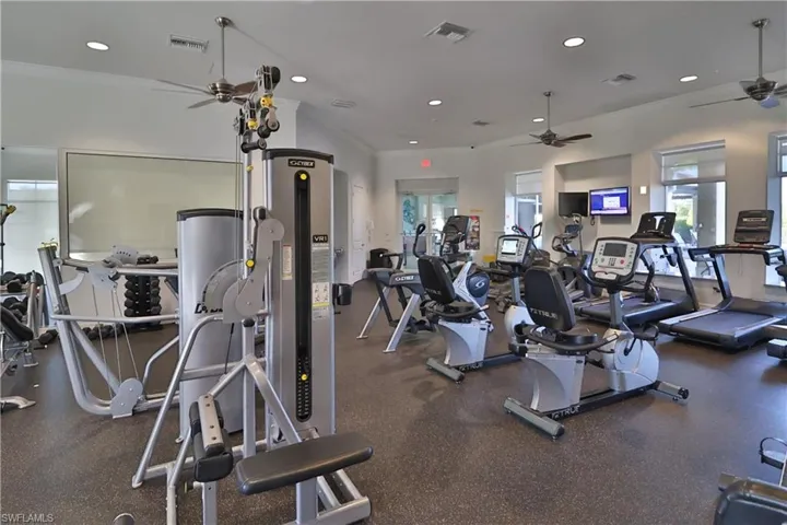Workout area featuring ceiling fan