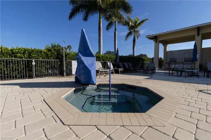View of pool featuring a patio and a community hot tub