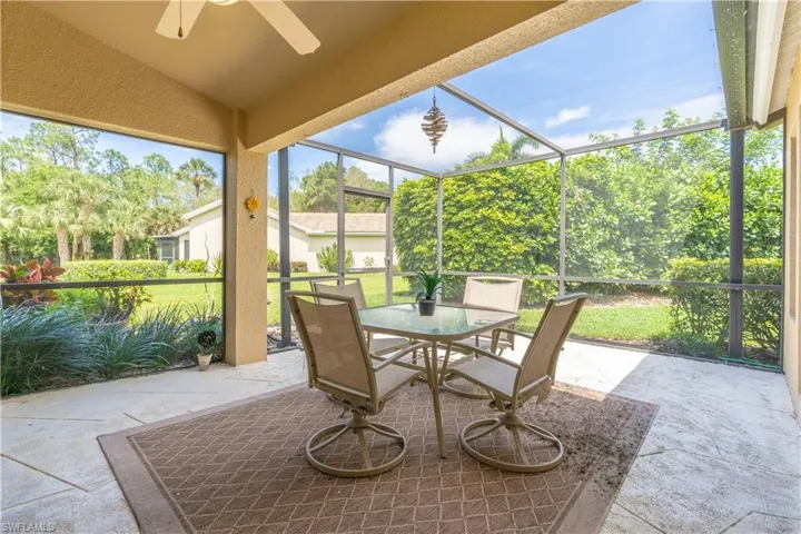 Sunroom with lofted ceiling and ceiling fan