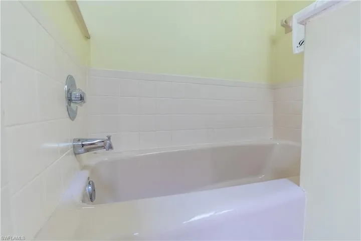 Bathroom with shower with separate bathtub