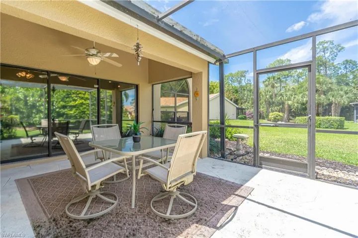 Sunroom / solarium with plenty of natural light and ceiling fan