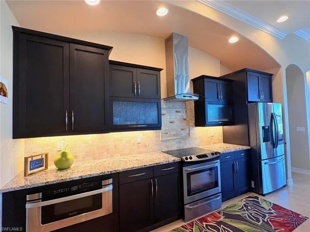 UPGRADED GRANITE COUNTERS AND UNIQUE BACKSPLASH INLAY