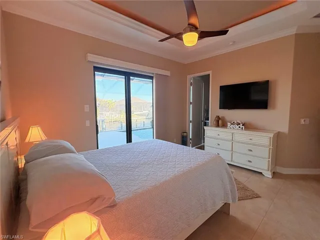 2ND MASTER SUITE WITH BATHROOM AND ACCESS TO POOL AND DOCK
