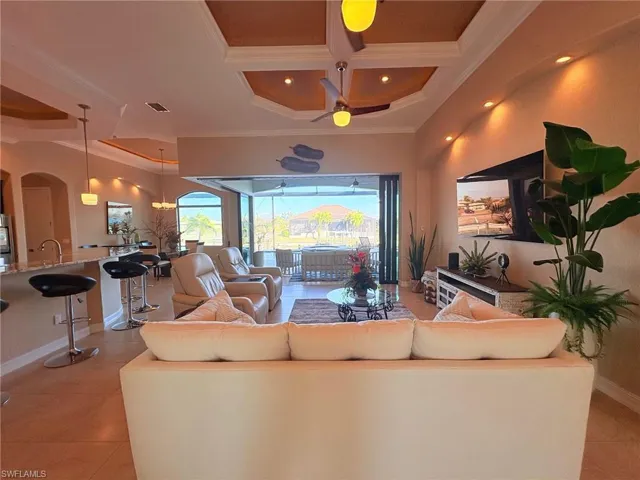 FABULOUS, HIGH END DETAILS... LIGHTED TRAY CEILINGS, ZERO CORNER SLIDERS OPEN TO THE OUTDOOR LIVING AREA
