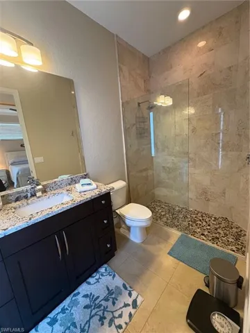 POOL BATH AND 2ND MASTER SUITE BATHROOM