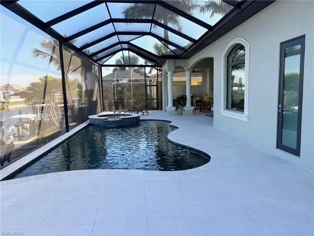 ENORMOUS POOL DECK.  SALT WATER HEATED POOL AND SPA
