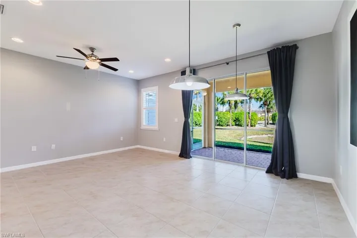 Unfurnished room with light tile patterned floors, ceiling fan, and recessed lighting