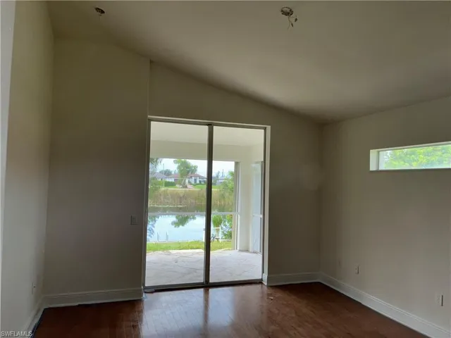 Sliding glass doors opening to a covered patio