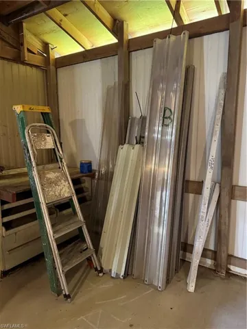 Large workshop in the back yard. hurricane shutters in the shed.