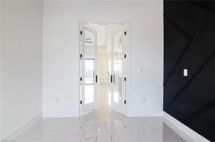 Unfurnished room with a ceiling fan and recessed lighting