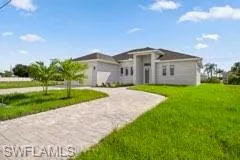 View of front of home with a front lawn