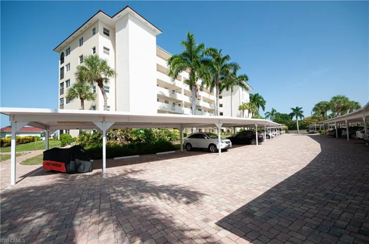 One covered parking space plus guest parking