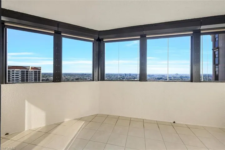Unfurnished room with plenty of natural light