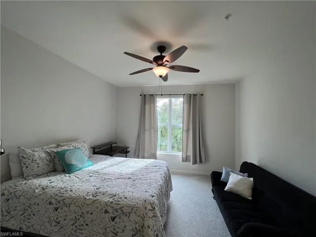 Master bedroom with new carpet & ceiling fan