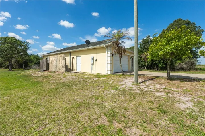 166 Pine Cone Ave, Montura Ranches, Florida 33440
