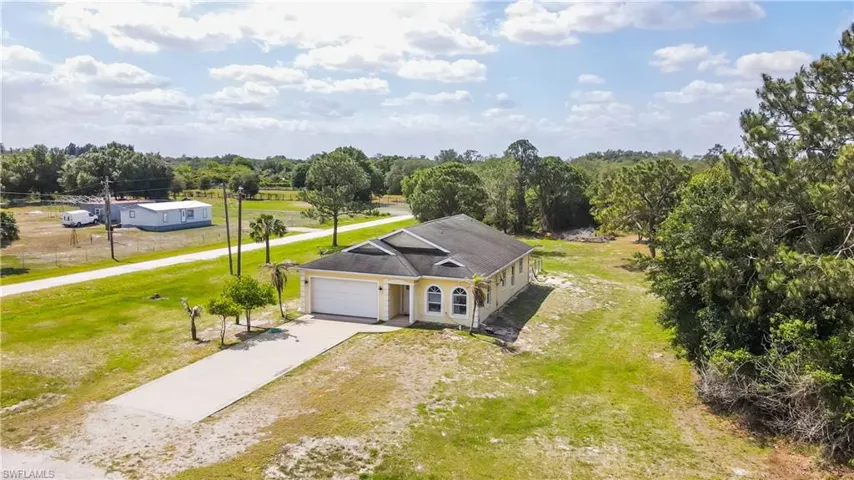 166 Pine Cone Ave, Montura Ranches, Florida 33440
