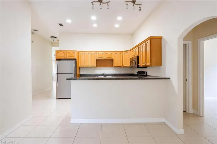 166 Pine Cone Ave, Montura Ranches, Florida 33440