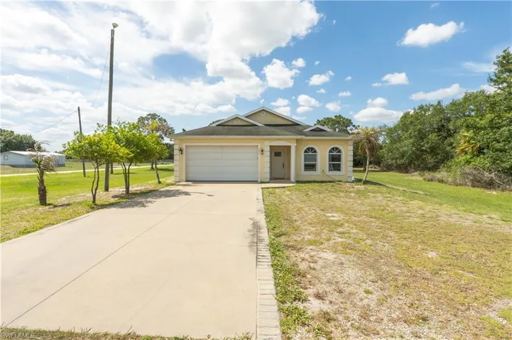166 Pine Cone Ave, Montura Ranches, Florida 33440