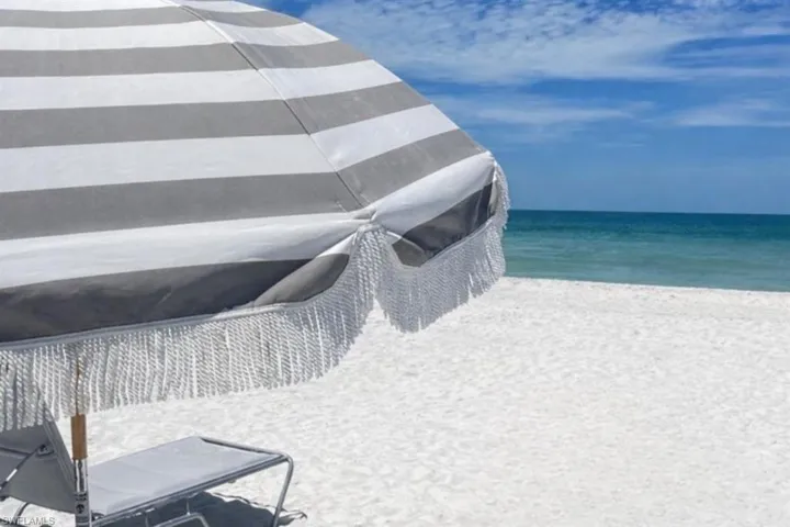 Enjoy the JW Marriott Marco Island Beach with effortless beach service, including four lounge chairs and an umbrella provided at each visit.