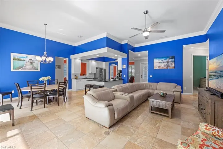 View of pool featuring a lanai, a patio area, and a pool with connected hot tub
