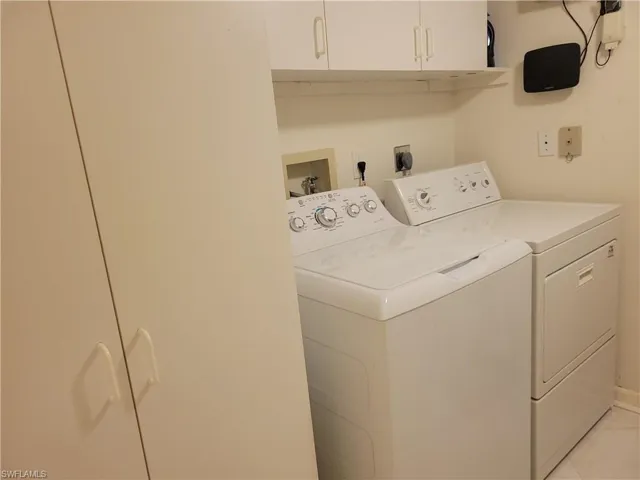 Large laundry room with extra cabinets