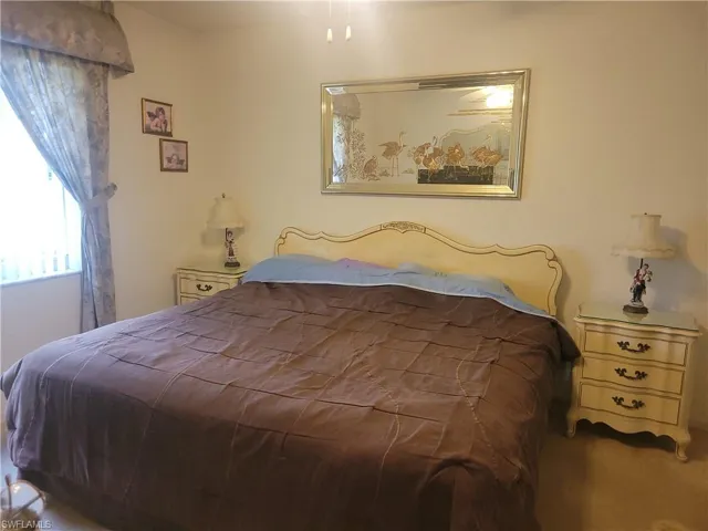 Easily holds king-sized bed and 2 night stands