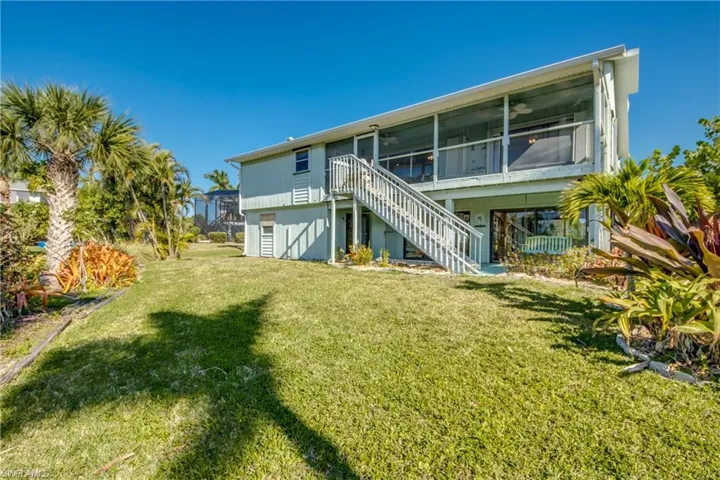 Back view of home overlooking golf course