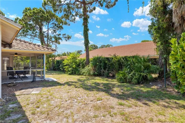View of yard with a patio and ceiling fan