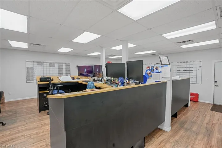 Office featuring a paneled ceiling