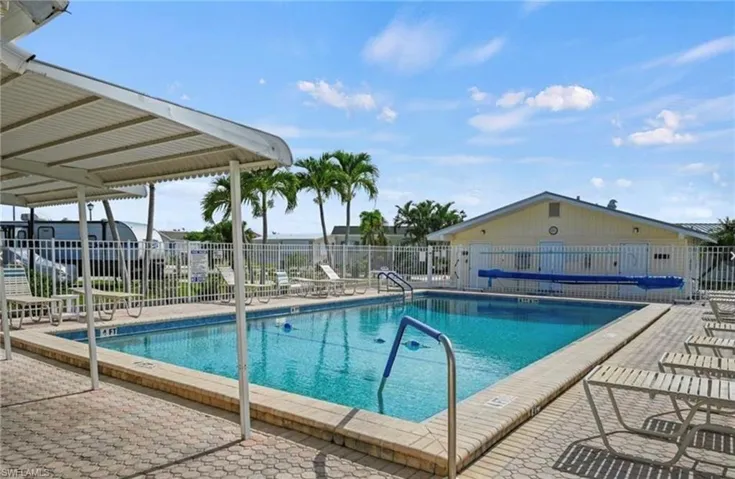 View of swimming pool with a patio area