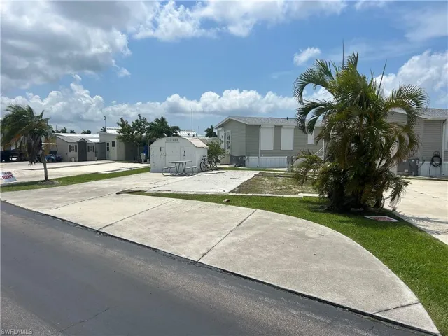 View of front of house featuring an outbuilding