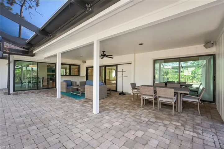 View of patio / terrace with ceiling fan and an outdoor hangout area