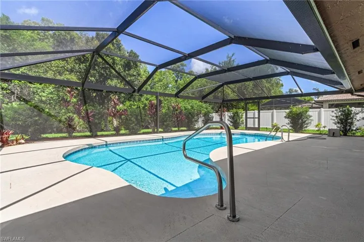 View of pool with a patio area and a fenced backyard