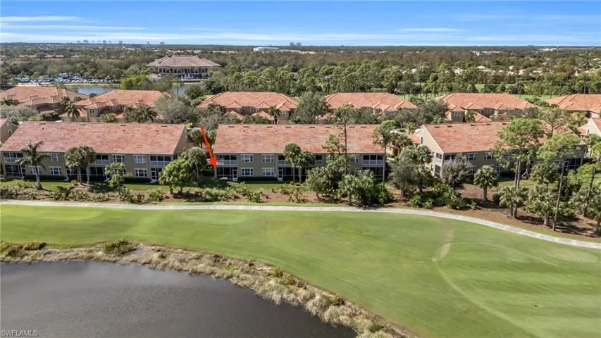 Bird's eye view of a nearby body of water and a golf club