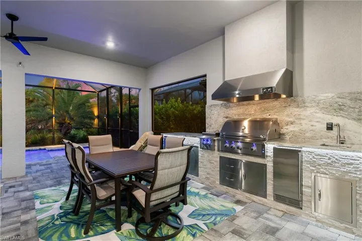 View of patio / terrace featuring area for grilling, an outdoor kitchen, and sink