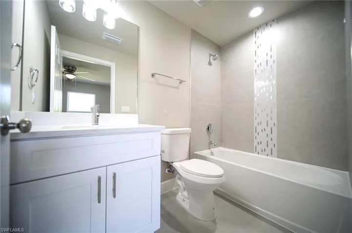 The Master Bathroom Comes With Custom Tile In The Tub/Shower Area And Quartz Countertops With Easy Close Cabinets & Drawer!