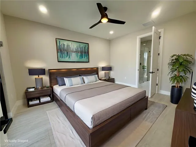 Bedroom featuring a ceiling fan, light wood-style flooring, and recessed lighting