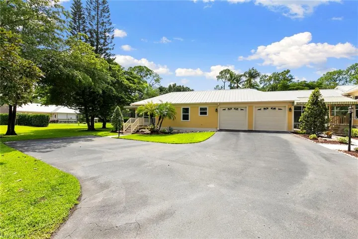 6460 Hidden Oaks Ln, Naples, Florida 34119