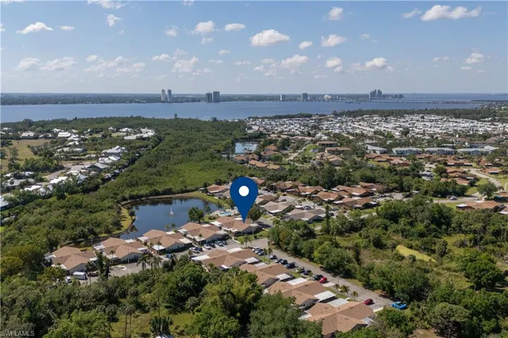 Aerial view with a water view and a residential view